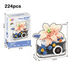 A set of 224 pieces of Camera RETRO building blocks featuring a camera and a flower design for DIY decor.