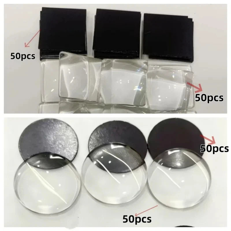 A collection of clear glass domes and black magnets, packaged in groups of 50 pieces.