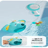 A blue elephant water spray bath toy is shown spraying water, with instructions for using the nozzle.