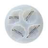 A silicone mold set with four depressions for creating shell and starfish shapes in fondant or modeling clay.