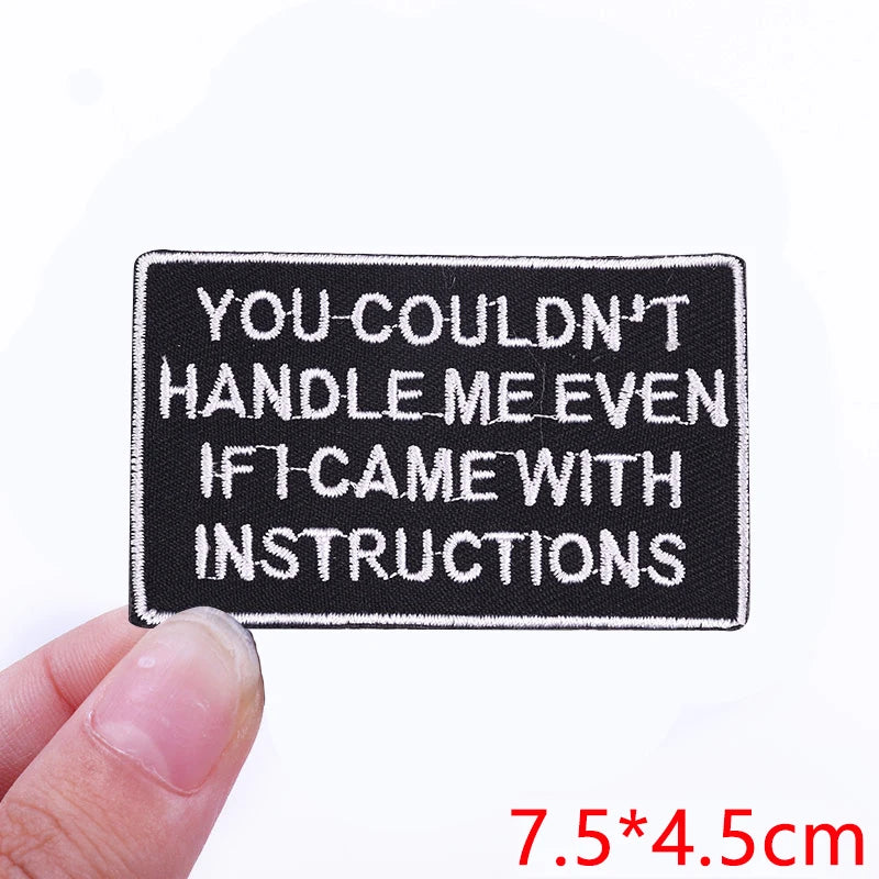 Black embroidered iron-on letter patch with white text that reads You couldn't handle me even if I came with instructions