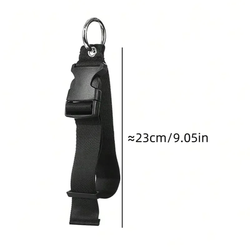 Black adjustable luggage hanging strap with a metal ring and buckle.