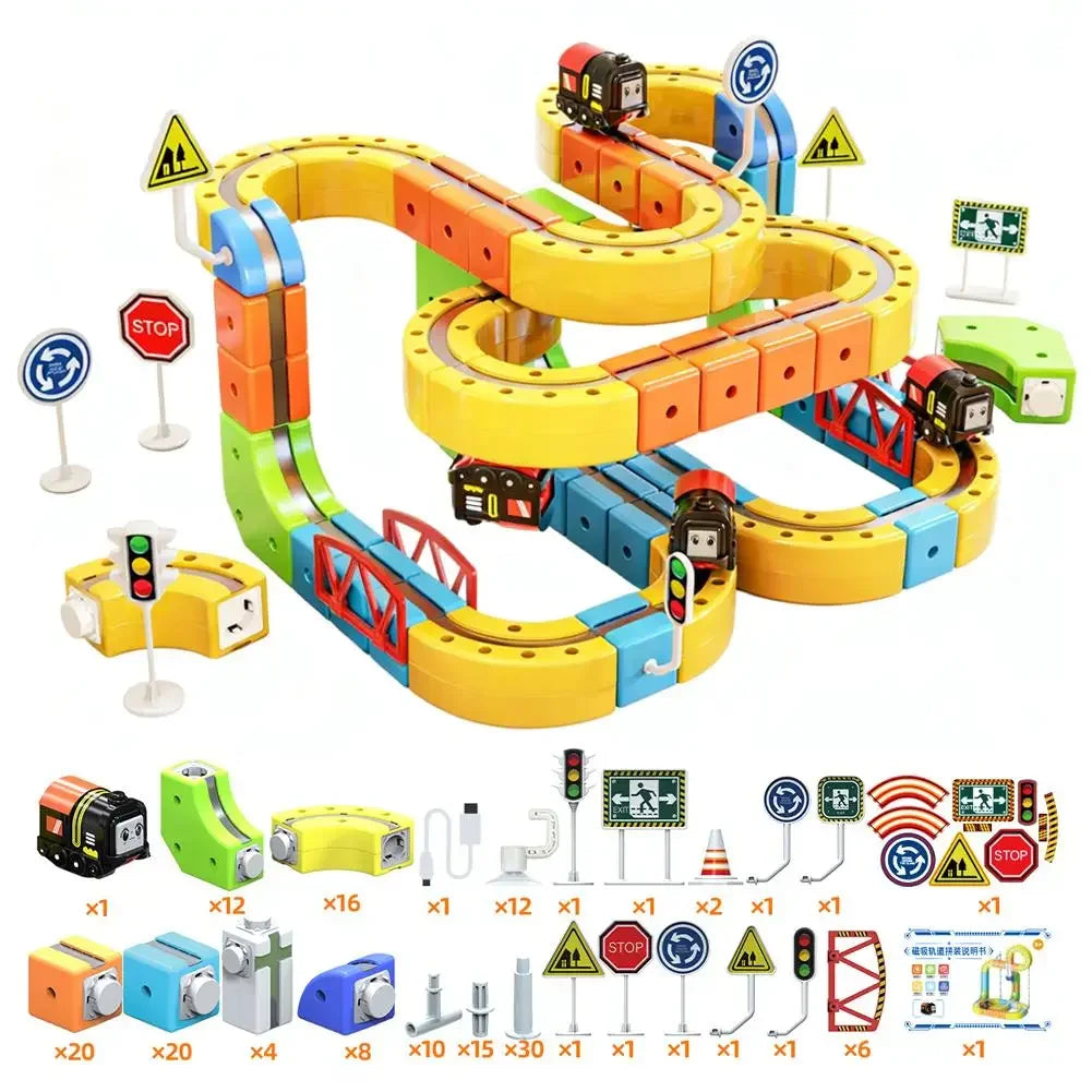 A set of yellow and orange electric train building blocks with various track pieces, engines, and accessories for STEM educat