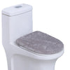 A white toilet with a soft gray flannel seat cover installed.