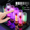 A hand is interacting with a row of touch control dimmable USB LED night lights in frosted glass containers.