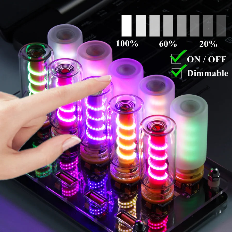 A hand is interacting with a row of touch control dimmable USB LED night lights in frosted glass containers.