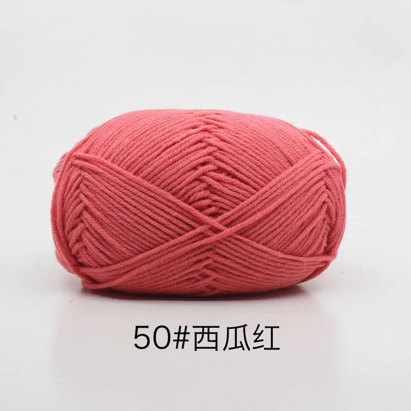 A ball of pink yarn, labeled as 50# Pink, used for knitting and crochet.