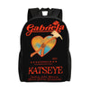 Black canvas daypack backpack featuring a graphic design with a heart and a hammer.