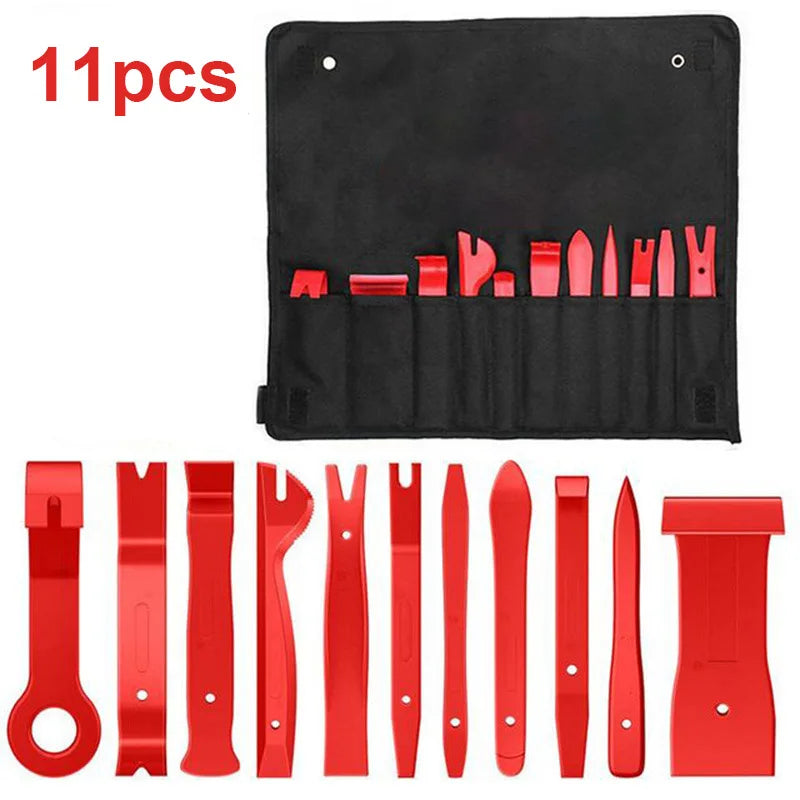 A set of 11 red auto trim removal tools and a storage bag displayed on a white background.