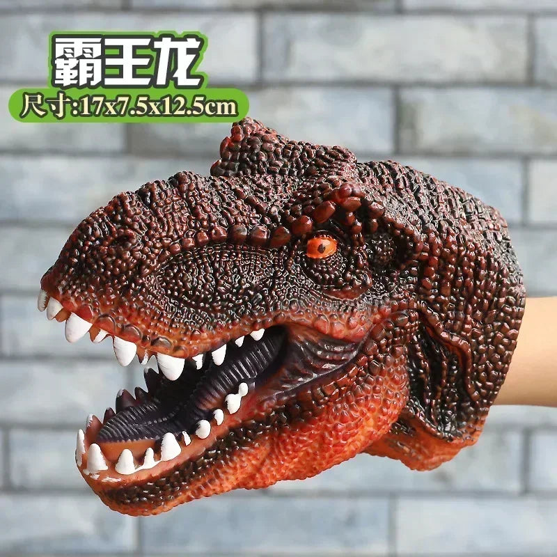 A realistic brown dinosaur hand puppet toy with sharp teeth and textured skin.
