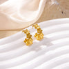 Boucles d'oreilles créoles en zircon cubique ton or