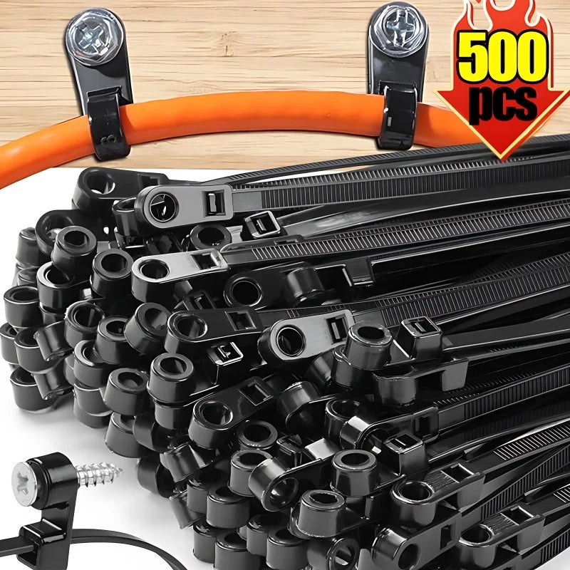 A bundle of black reusable screw-hole cable ties with mounting holes and an orange cable shown on a wooden surface.