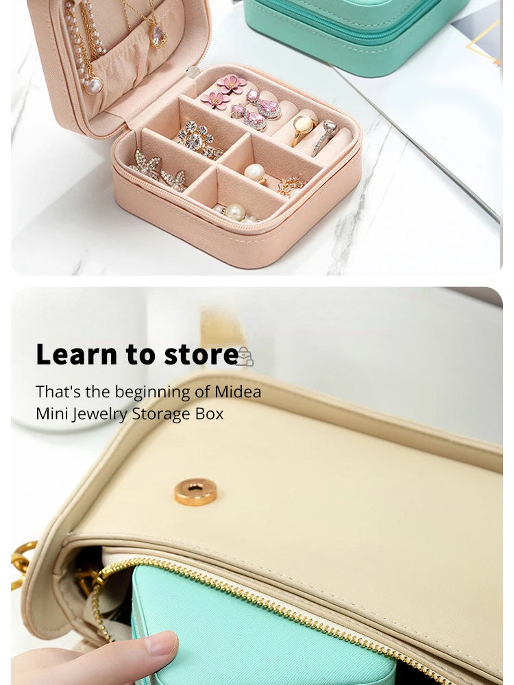 A pink PU leather jewelry storage box is shown open, displaying various rings and earrings inside.
