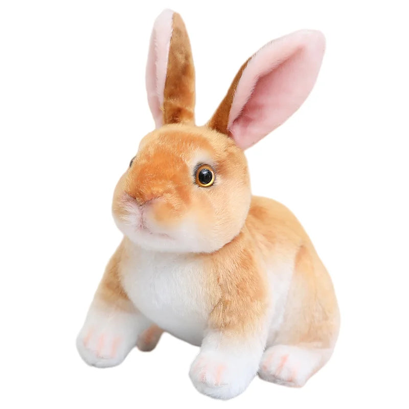 A fluffy, light brown plush rabbit with pink inner ears is shown in a close-up view.