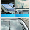 Close-up of a car windshield showing wiper blades and water streaks, demonstrating the new wiper booster spring.