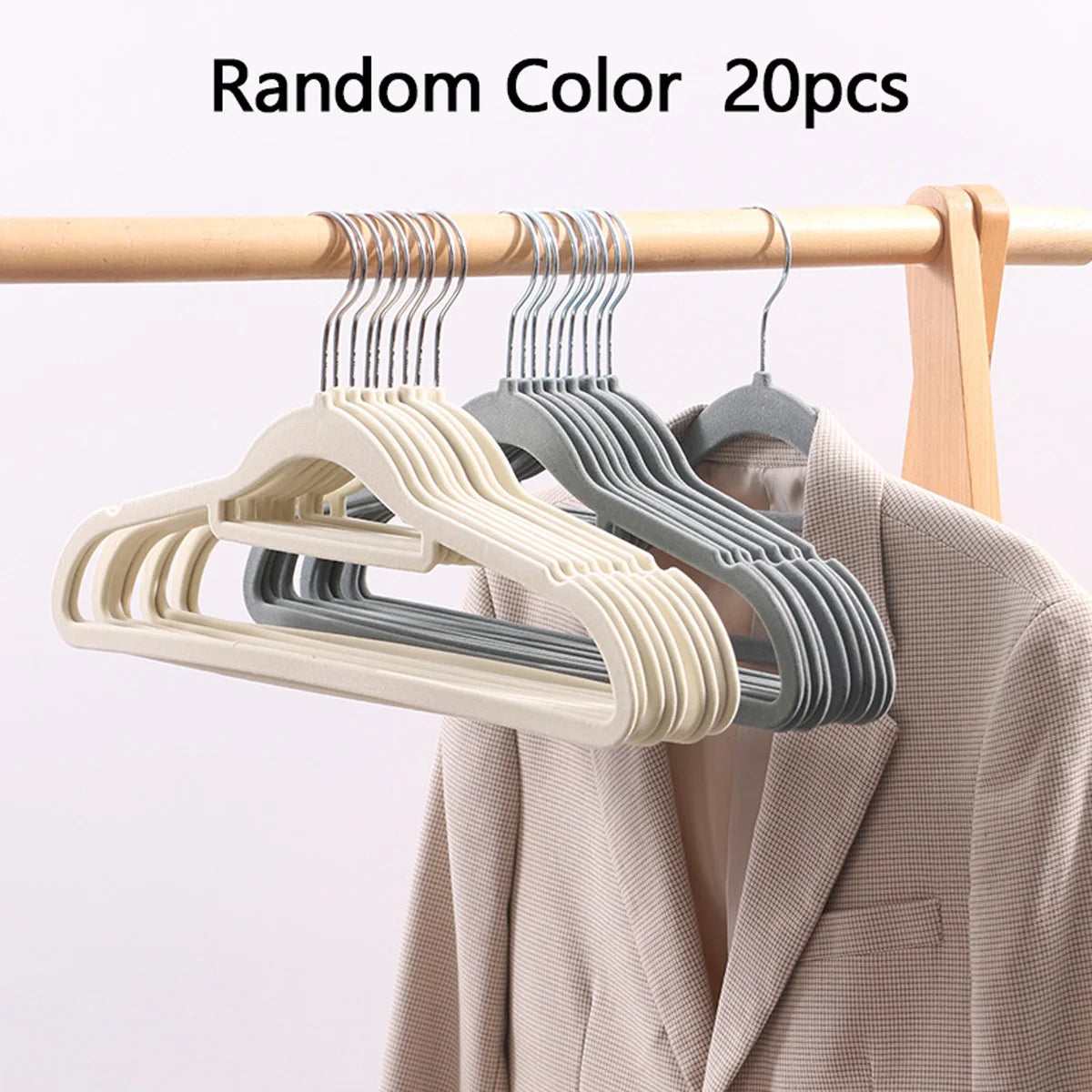 20 pieces of random color premium velvet non-slip hangers hanging on a wooden rod.