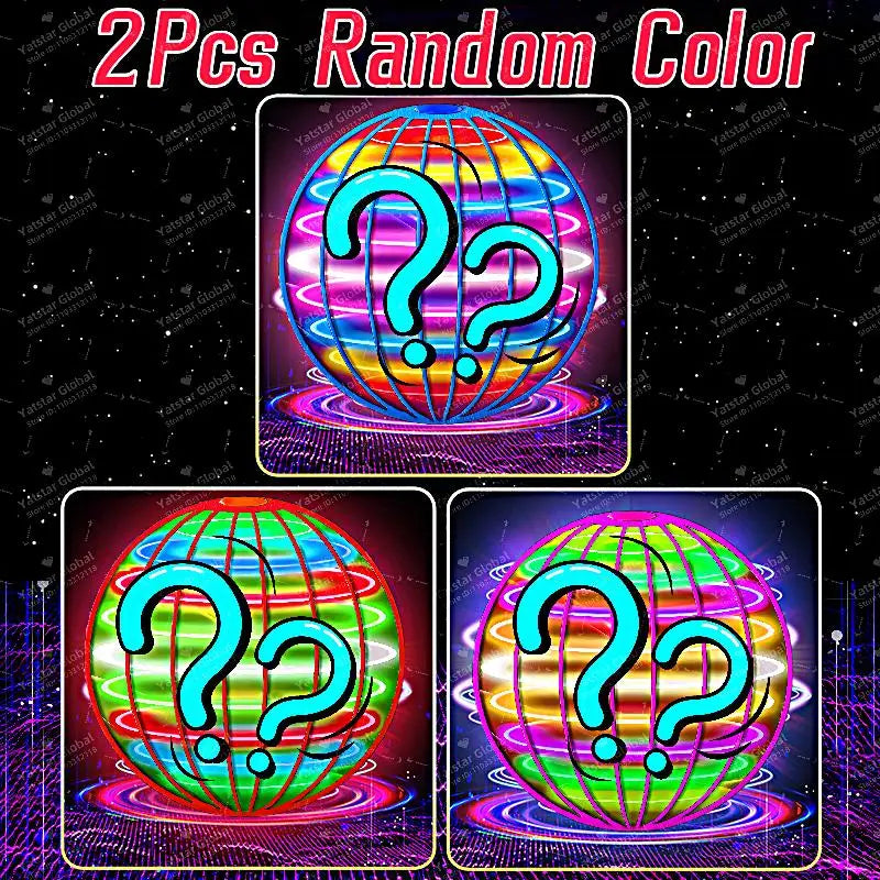 Two random color LED flying balls with question marks displayed against a dark background