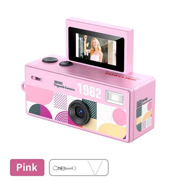 Mini cámara rosa con pantalla plegable y lente visible en cuerpo rectangular