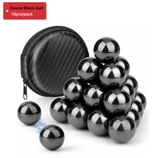 A pile of black magnetic fidget balls with a storage case shown on a white background.