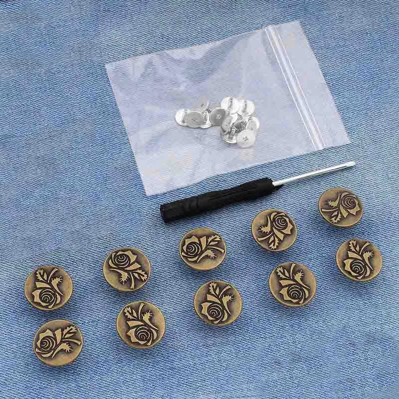 Silver instant no-sew snap button kit for loose jeans placed on a white plastic bag.