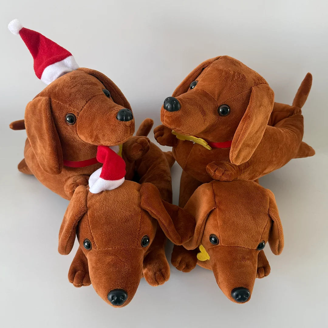 A set of three brown plush cartoon dog figures, including one wearing a Santa hat, lying together.