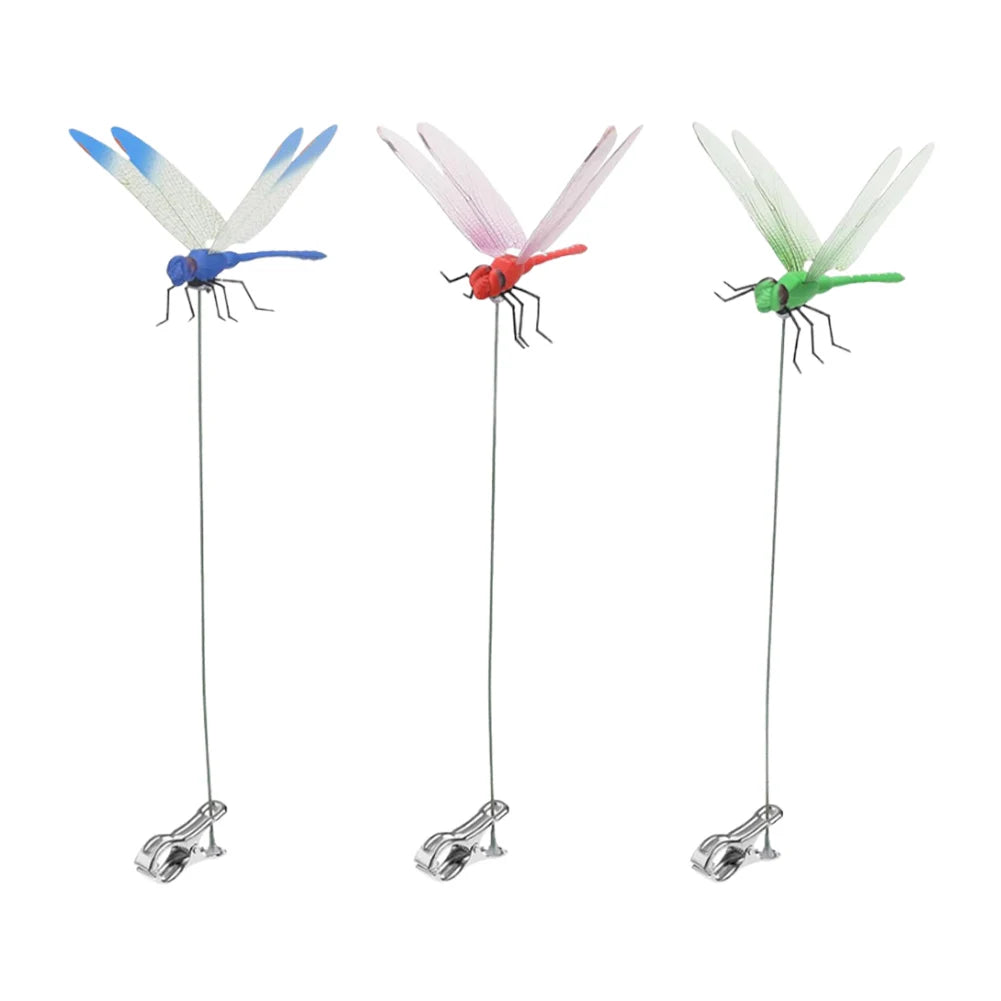 Three lifelike dragonfly clips in blue, pink, and green for garden decoration