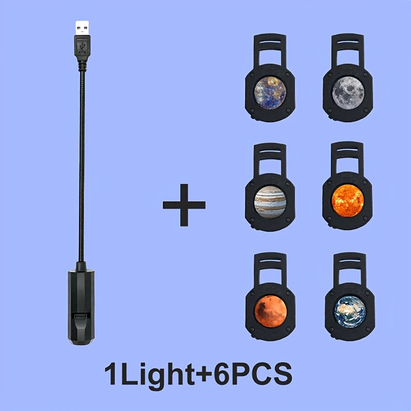 A set of seven LED projector lights featuring various celestial patterns like the moon, sun, and planets.