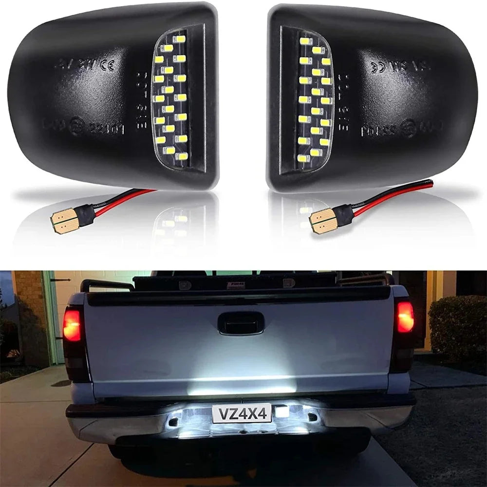 A close-up of an 18-LED license plate light assembly for Chevy Silverado and GMC Sierra trucks.