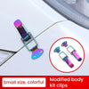 A close-up of a modified body kit clip featuring colorful, small alloy pins for car or truck modification.