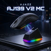 AJ139 V2 MC wireless gaming mouse resting on a black magnetic charging base with RGB lighting.