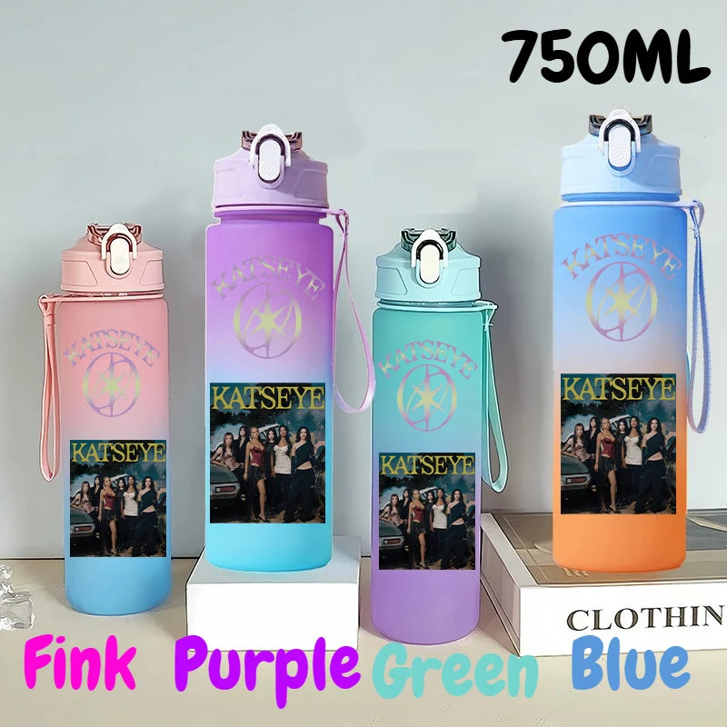 A set of three 750ml portable sports water bottles in pink, purple, green, and blue colors.