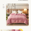 A pink velvet duvet cover and blanket are shown, highlighting the soft texture and luxurious fabric.