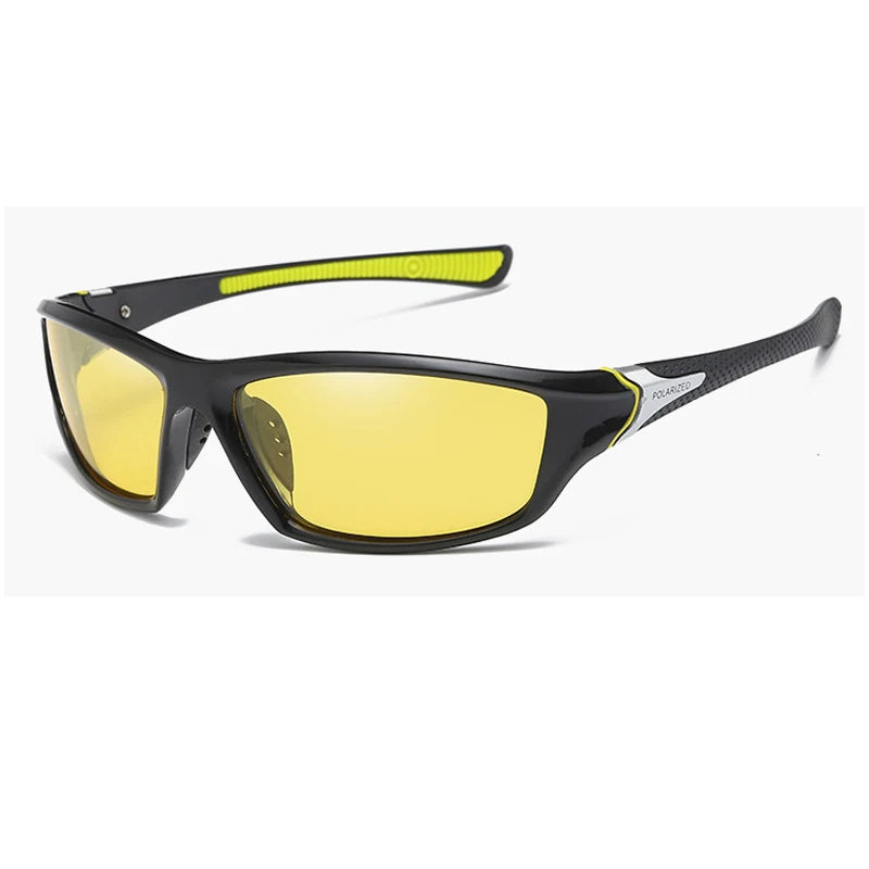 A pair of black polarized sports sunglasses with yellow lenses and a lime green accent.
