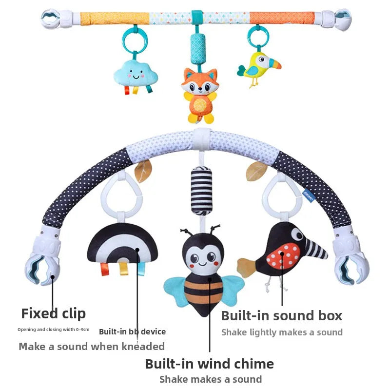 Baby stroller arch toy featuring hanging plush charms and a fixed clip for making sounds