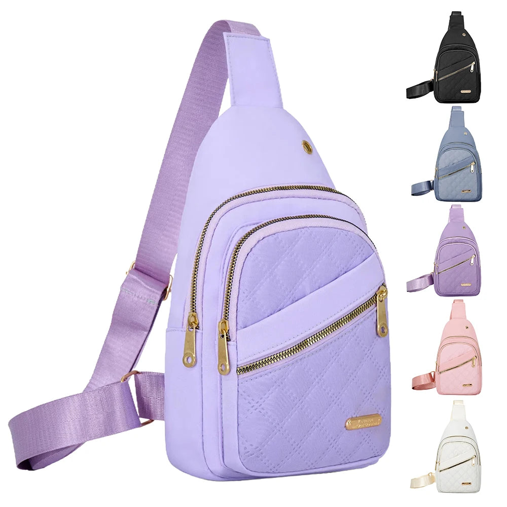 A light purple quilted crossbody sling bag with a matching strap and multiple zippered compartments.