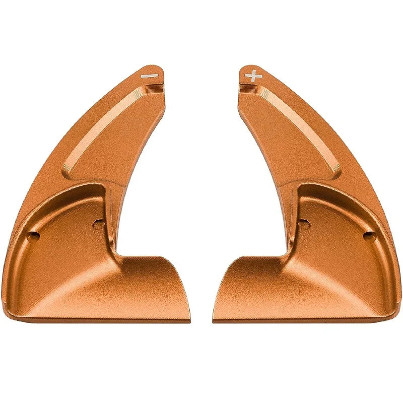 A pair of copper-colored anodized aluminum shift paddle extenders shown from the side.