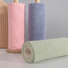 Three rolls of reusable microfiber cleaning towels in pink, purple, and light green stacked vertically.