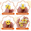 Handmade yellow wool felt bee pompoms with wings for crafts and decorations