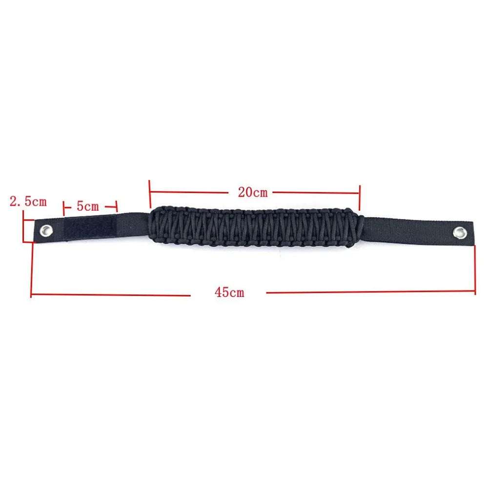 Black paracord grab handles with adjustable length and mounting points for a vehicle.