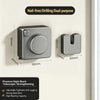 A close-up view of a silver retractable clothesline with a mounting bracket and a tightening mechanism.