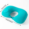 A teal self-inflating travel neck pillow with a soft flocking cover shown from the side.