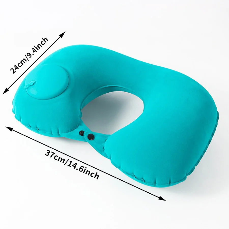 A teal self-inflating travel neck pillow with a soft flocking cover shown from the side.