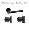 Matte black bathroom hardware set including a toilet paper holder and two towel hooks
