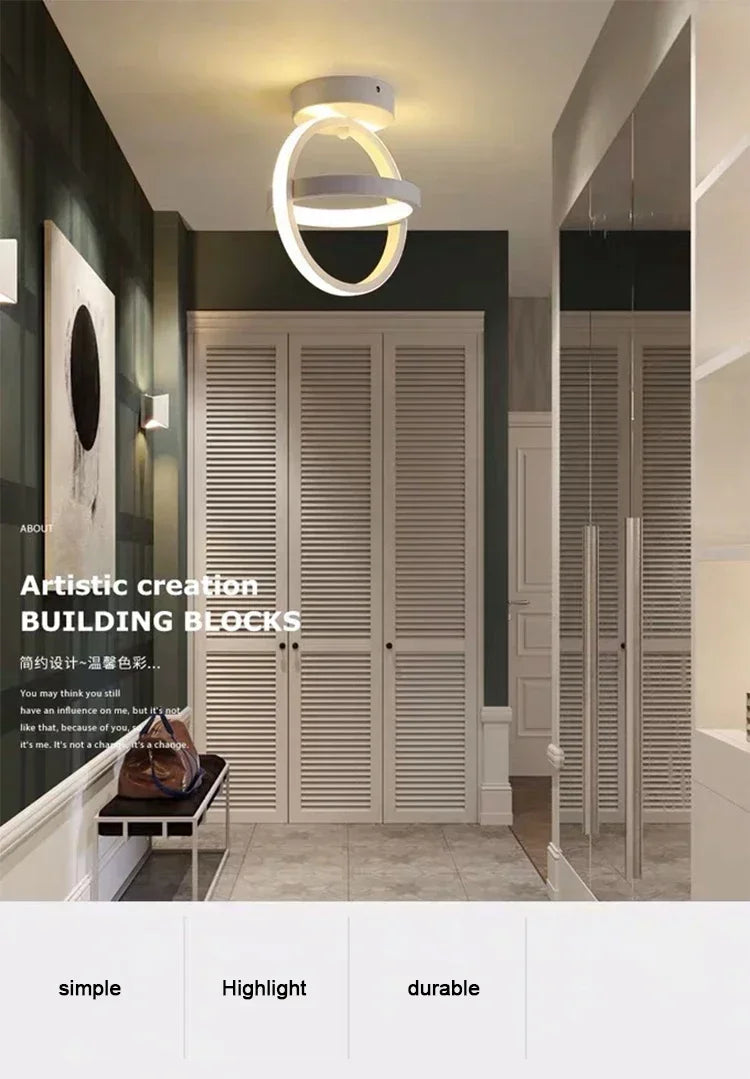 Modern clover LED ceiling light fixture mounted above a wooden cabinet in a modern interior setting.