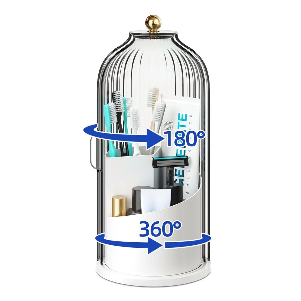 A clear glass rotating toothbrush holder with a dustproof cover showing various toothbrushes and accessories.