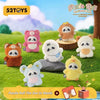 A collection of adorable panda plush toys and accessories displayed on green grass.