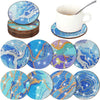 A set of eight DIY diamond art coasters featuring blue and white marbled designs on wooden bases.