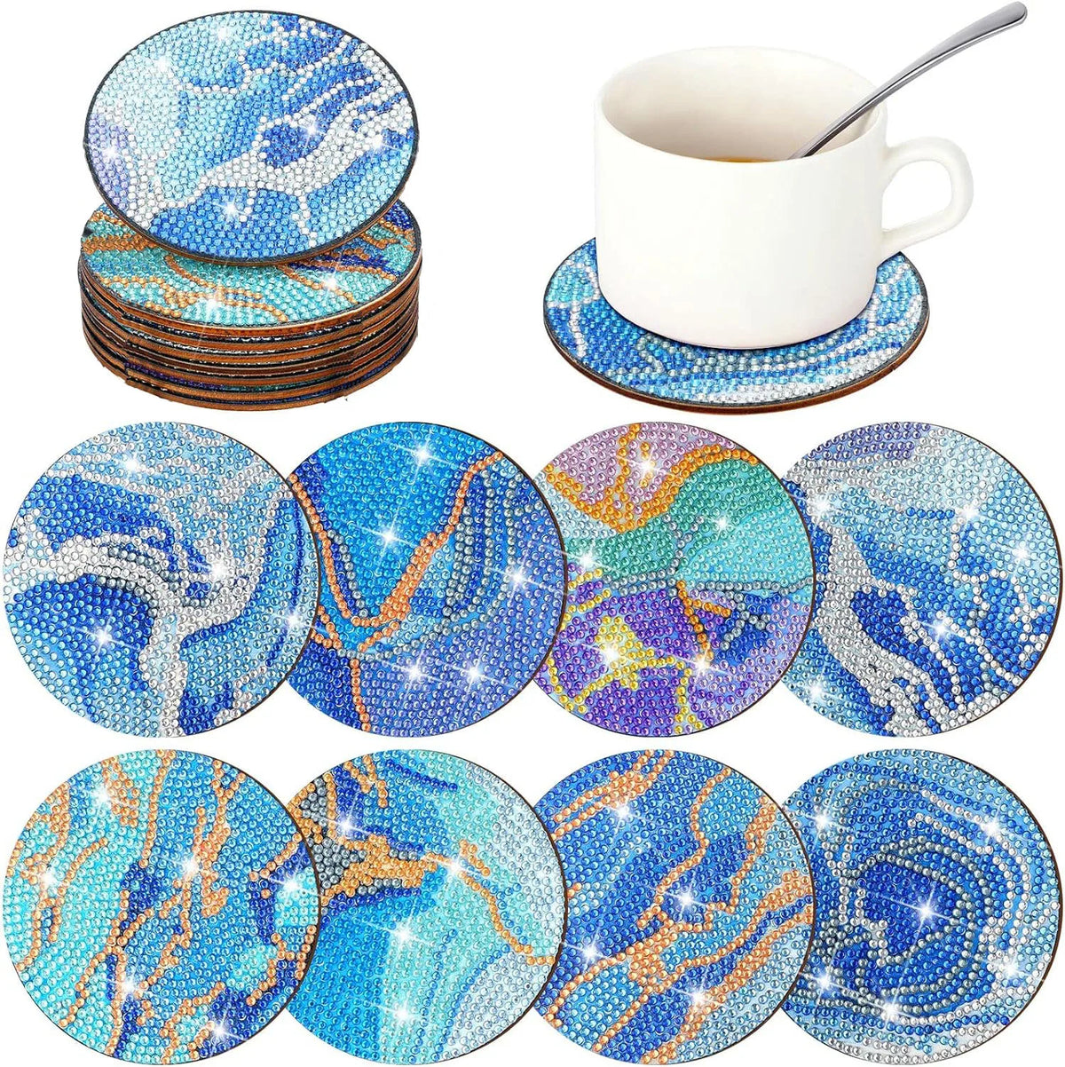 A set of eight DIY diamond art coasters featuring blue and white marbled designs on wooden bases.