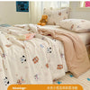 A light pink duvet cover with a floral pattern and lace trim is displayed on a bed.