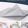 Close-up of a triple-layer mesh scouring cloth demonstrating high quality and durability for dishwashing.